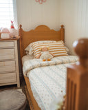 Little House on the Prairie children’s quilt set in soft cotton muslin with vintage floral print and storybook-inspired design.