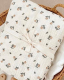 Vintage Rose sheet set close up in soft cotton muslin featuring romantic floral print in soft blush and cream tones, and vintage-inspired charm for dreamy bedrooms.