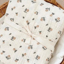 Vintage Rose sheet set close up in soft cotton muslin featuring romantic floral print in soft blush and cream tones, and vintage-inspired charm for dreamy bedrooms.