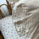 Vintage Rose sheet set close up in soft cotton muslin featuring romantic floral print in soft blush and cream tones, and vintage-inspired charm for dreamy bedrooms.