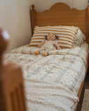 Little House on the Prairie children’s quilt set in soft cotton muslin featuring vintage floral bedding inspired by storybook living and country charm.
