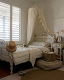 Vintage-inspired Little House on the Prairie quilt set in soft cotton muslin for whimsical children’s bedrooms and nurseries.