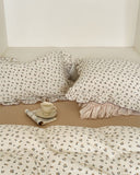 Vintage Rose cotton muslin quilt cover set featuring romantic floral bedding in soft blush and cream tones.